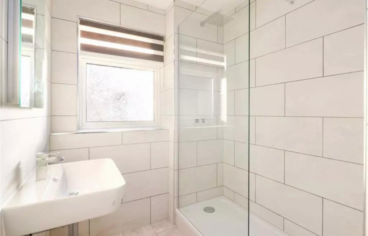 Walk-in shower room with glass screen and basin, London & Essex