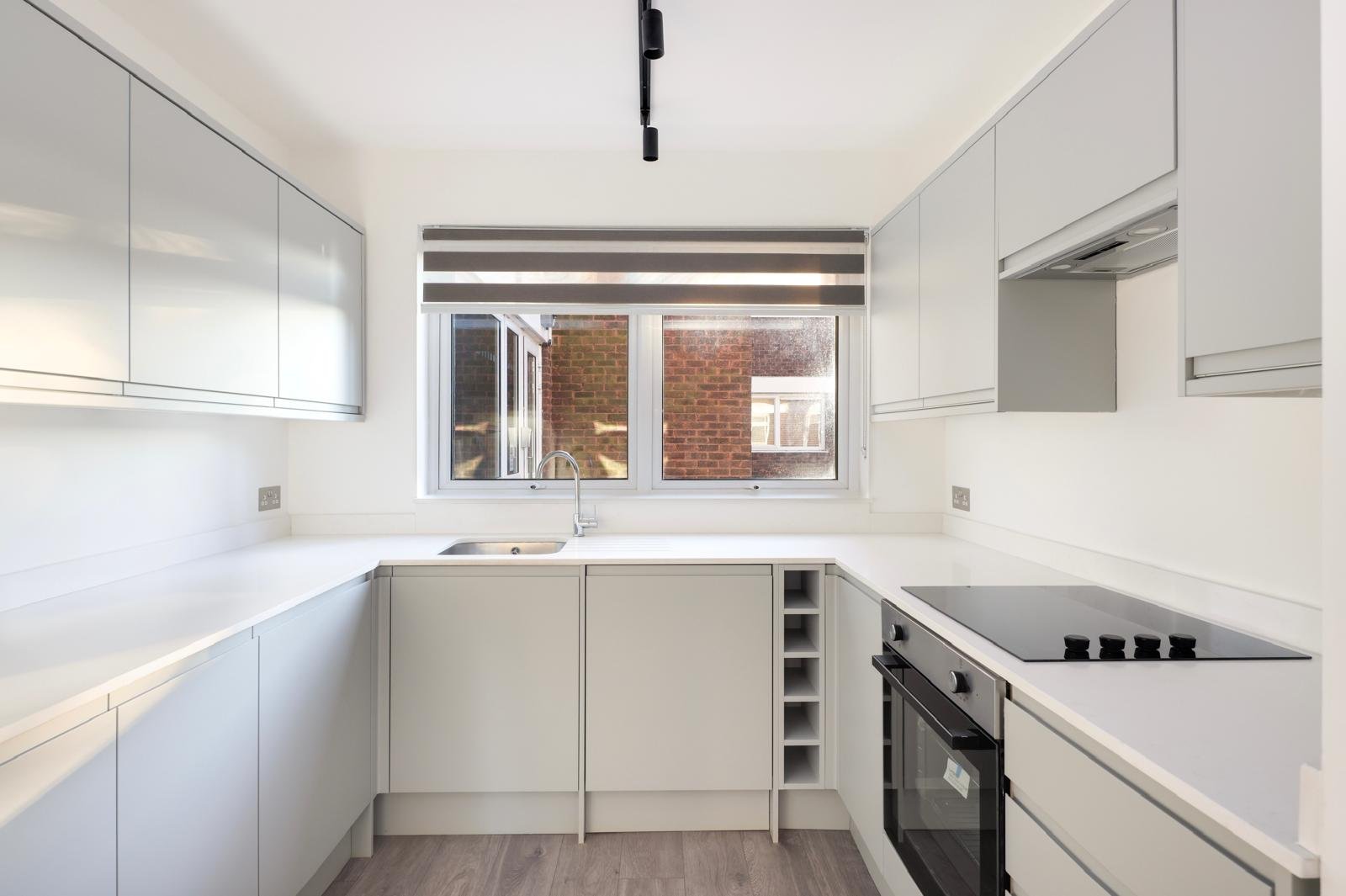 Open-plan kitchen renovation completed in a London apartment
