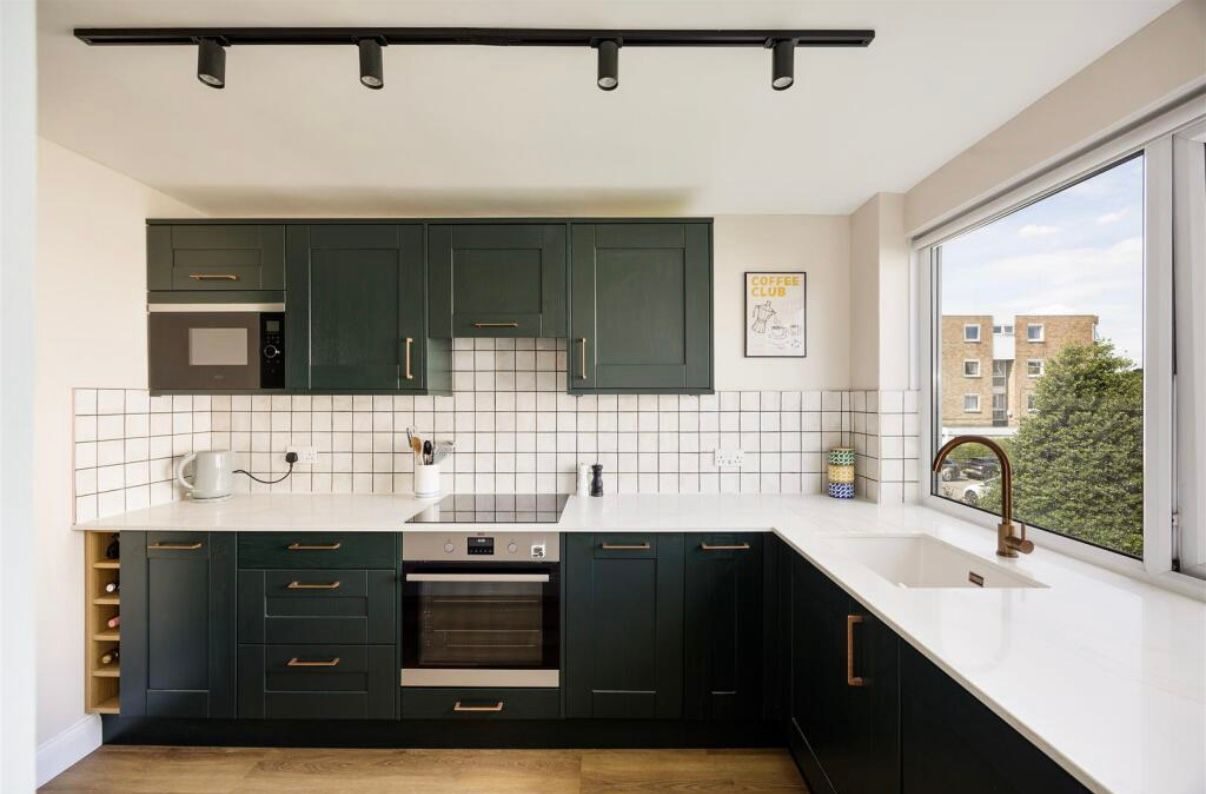 Alderbrook, Queenswood Gardens — green shaker kitchen